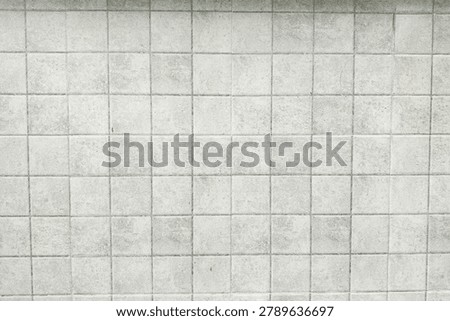 Clean white ceramic tile texture background with square pattern. Minimal architectural surface for interior design, construction, and decoration concepts.
