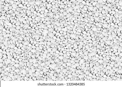 Clean White Pebbles texture. Small stones on the ground. Top view of Natural colorful gravel on the summer beach - Shutterstock ID 1320484385