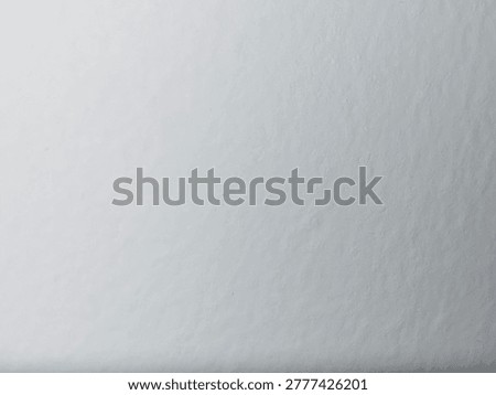 Clean white wall texture background with subtle surface detail. Plain white background suitable concept for designers. 