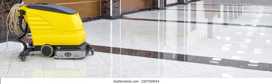 Cleaned Floor Of Hall Or Lobby, Panorama Of Vacuum Cleaner For Commercial Cleaning Service And Buffed Marble Floor. Banner With Shiny Clean Interior And Cleaning Machine. Clean Office Concept.