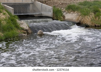 Cleaned Sewage Flowing Out From Water Reclamation Facility To A River