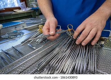 Cleaned Surgical Instruments Are Sorted Into An Instrument Tray