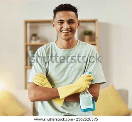 Cleaner, man in portrait and chemical with arms crossed, happy and hygiene with housekeeping, detergent and gloves. Janitor, cleaning solution in bottle with smile and professional housekeeper