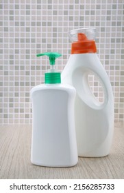 Cleaning Agent, Detergent And Liquid Soap Dispenser Bottle On The Bathroom Background. Product Presentation Of Cleaning Products Mockup. Home Cleaning Supplies In Plastic Bottles Mock Up