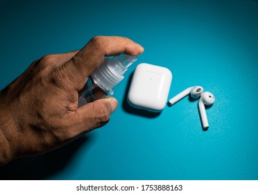 Cleaning Airpods With Sanitizer To Prevent From Corona Virus, Covid 19