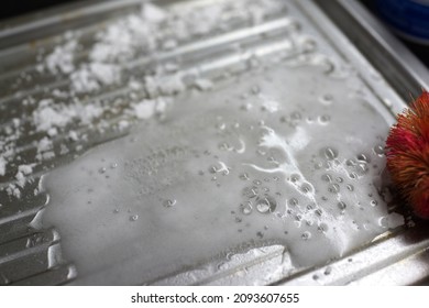 Cleaning Baking Tray With Baking Soda And Vinegar Close Up. Soft Focus Image.                    