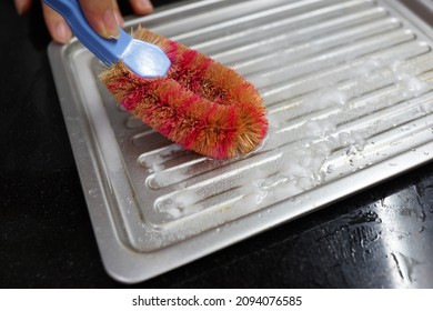 Cleaning Baking Tray With Baking Soda And Vinegar Close Up. Soft Focus Image.