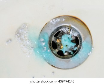 Cleaning Bath Plug Hole With Washing Crystal Chemicals