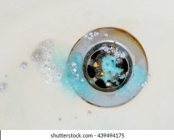 Cleaning Bath Plug Hole With Washing Crystal Chemicals