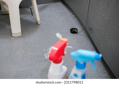 Cleaning the bath room at home - Shutterstock ID 2311798011