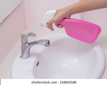 Cleaning Bathroom Sink With Spray Bottle.