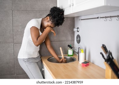 Cleaning Blocked Sink And Drain In Kitchen Using Plunger