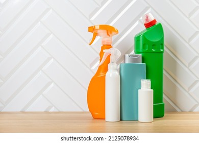 Cleaning Bottles For Different Surfaces In Kitchen, Bathroom And Other Rooms. Spring Regular Cleanup. Set Home Cleaning Products