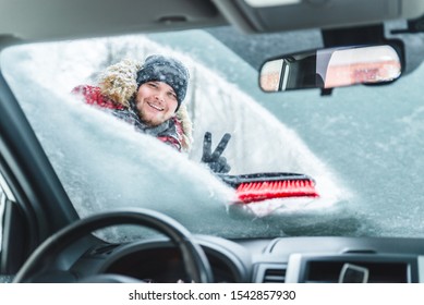 Cleaning Car After Snow Storm Smiling Man With Brush