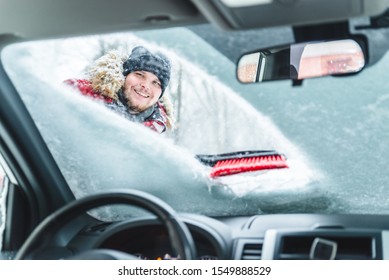 Cleaning Car After Snow Storm Smiling Man With Brush