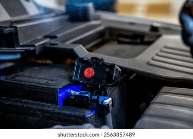 Cleaning car battery terminals from oxidation - Powered by Shutterstock