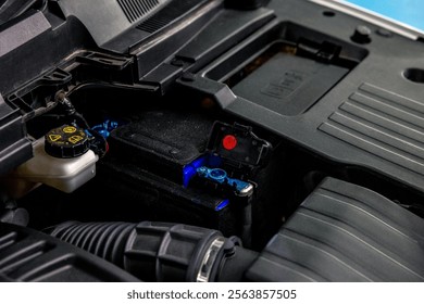 Cleaning car battery terminals from oxidation - Powered by Shutterstock