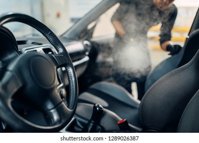 Cleaning Of Car Salon With Steam Cleaner