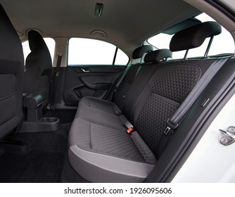 Cleaning car service theme. Dark grey textile car seats