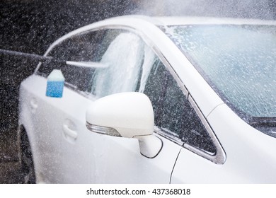 Cleaning Car Using High Pressure Water And Chemicals