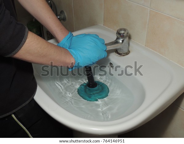 Cleaning Clogged Sink Plunger Stock Photo Edit Now 764146951