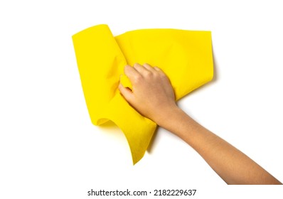 Cleaning Cloth In Hand Isolated. Wipe Yellow Rag, Cleaning Microfiber Towel, Wiping Cotton Napkin, Microfibre Fabric For Cleanliness, Kitchen Cloths On White Background