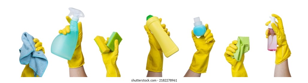 Cleaning concept - hands in yellow gloves holding cleaning supplies  - Powered by Shutterstock