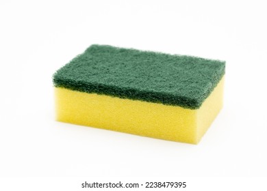 Cleaning concept, Yellow sponge for dishwashing in kitchen isolated on white background.