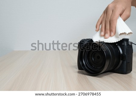 Cleaning Digital Camera Body with Microfiber Cloth
