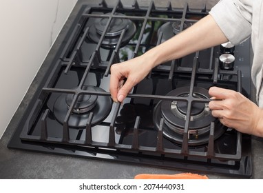 Cleaning Dirty Gas Stove Top. Woman Preparing To Clean Kitchen At Home. Household, Hygiene And Cleaning Concept