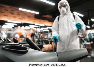 Cleaning and disinfection in gym equipment to avoid the coronavirus epidemic. Gym cleaning and disinfection. Infection prevention and control COVID-19, corona breaking new situation - Powered by Shutterstock