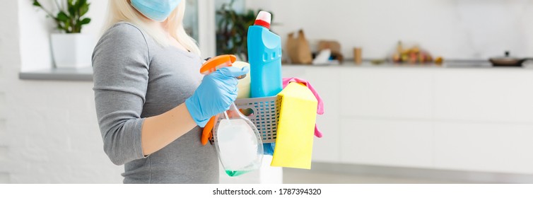 Cleaning and Disinfection at town complex amid the coronavirus epidemic. Professional teams for disinfection efforts. Infection prevention and control of epidemic. Protective gloves and mask - Shutterstock ID 1787394320