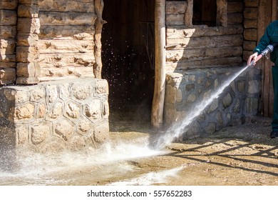 Cleaning Farm, Stable With Water Under Pressure