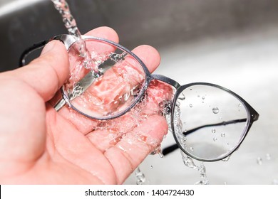 cleaning glasses lens to be clean, clear