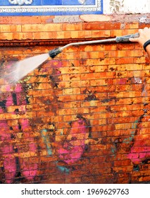 Cleaning Graffiti With High Pressurized Water Jet
