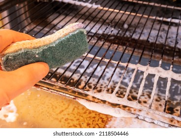 Cleaning The Grill In The Oven