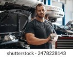 Cleaning, hands and portrait of mechanic in workshop with car service, maintenance or auto insurance. Cloth, engine and proud man in garage for oil change, motor repair or vehicle quality assurance