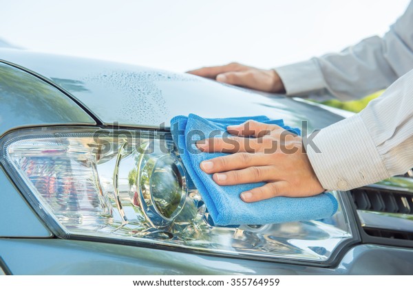 Cleaning
headlight with microfiber cloth,car
lights