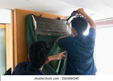 Cleaning Home Air Conditioner In Summer, Soft Focusing.