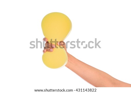 Cleaning the house and sanitation topic: Woman Hand holding a yellow sponge wet with foam isolated on white background with clipping path