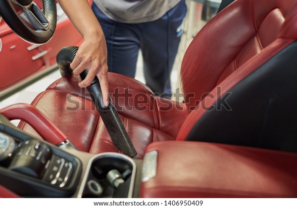 Cleaning of interior of the car with vacuum
cleaner, Car cleaning