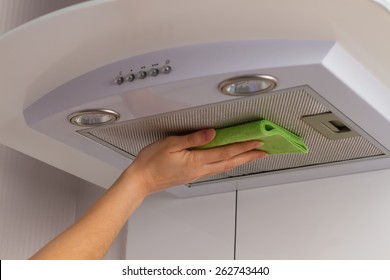 Cleaning Kitchen. Washing Kitchen Hood.