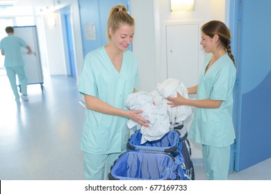 Cleaning Ladies Doing Housekeeping In Clinic