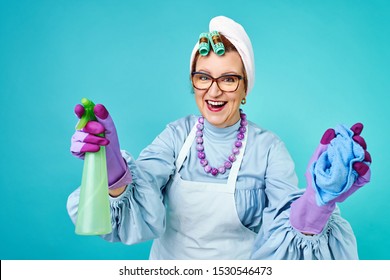 Cleaning Lady Fun. Elderly funny housewife fooling around with a broom. Full body isolated. Comical cleaning lady, old woman funky