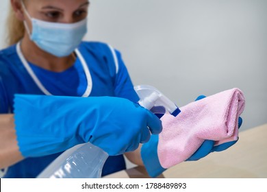 A Cleaning Lady Prepares A Cloth And Agents For Cleaning