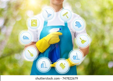 Cleaning lady provides cleaning services on blurred background.