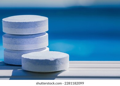 cleaning and maintenance of swimming pools with chlorine tablets - Powered by Shutterstock