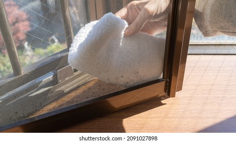 Cleaning The Mold On The Screen Door.