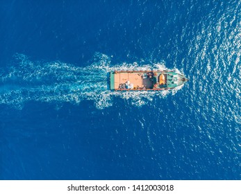 Cleaning Ocean From Trash Boat Nets For Fishing Plastic Bottles. Concept Pollution Of Water Environment.