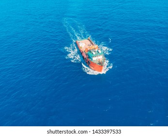 Cleaning Ocean From Trash Boat Nets For Fishing Plastic Bottles. Concept Pollution Of Water Environment.